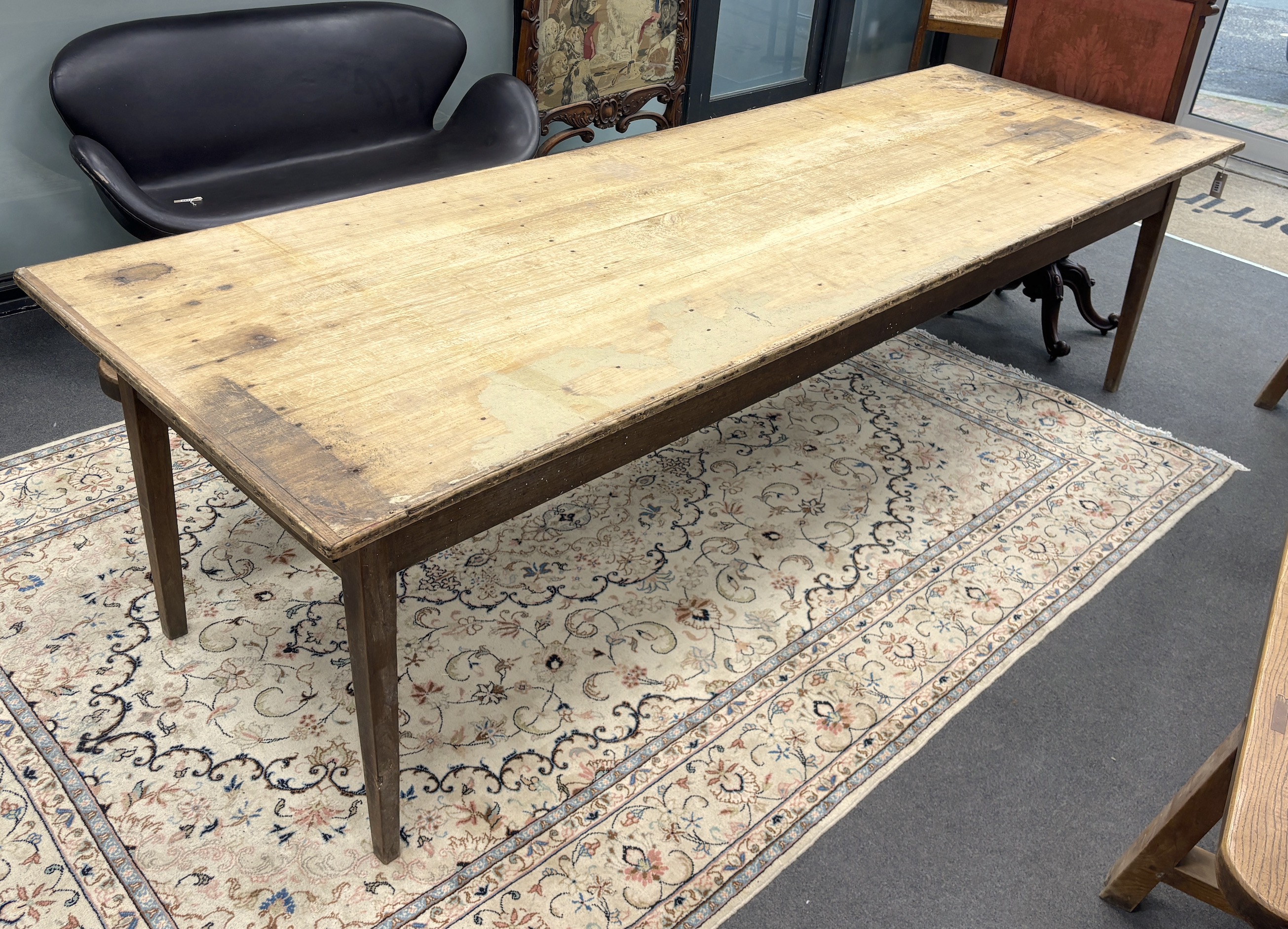 A 19th century French rectangular oak and fruitwood two drawer kitchen table, width 281cm, depth 95cm, height 77cm